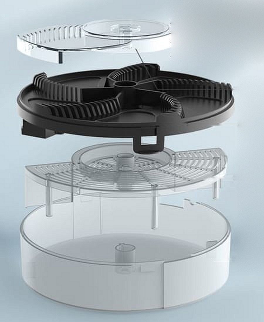 The trap pulled apart: clear cover, turning bait disc, escape grid and collection box
